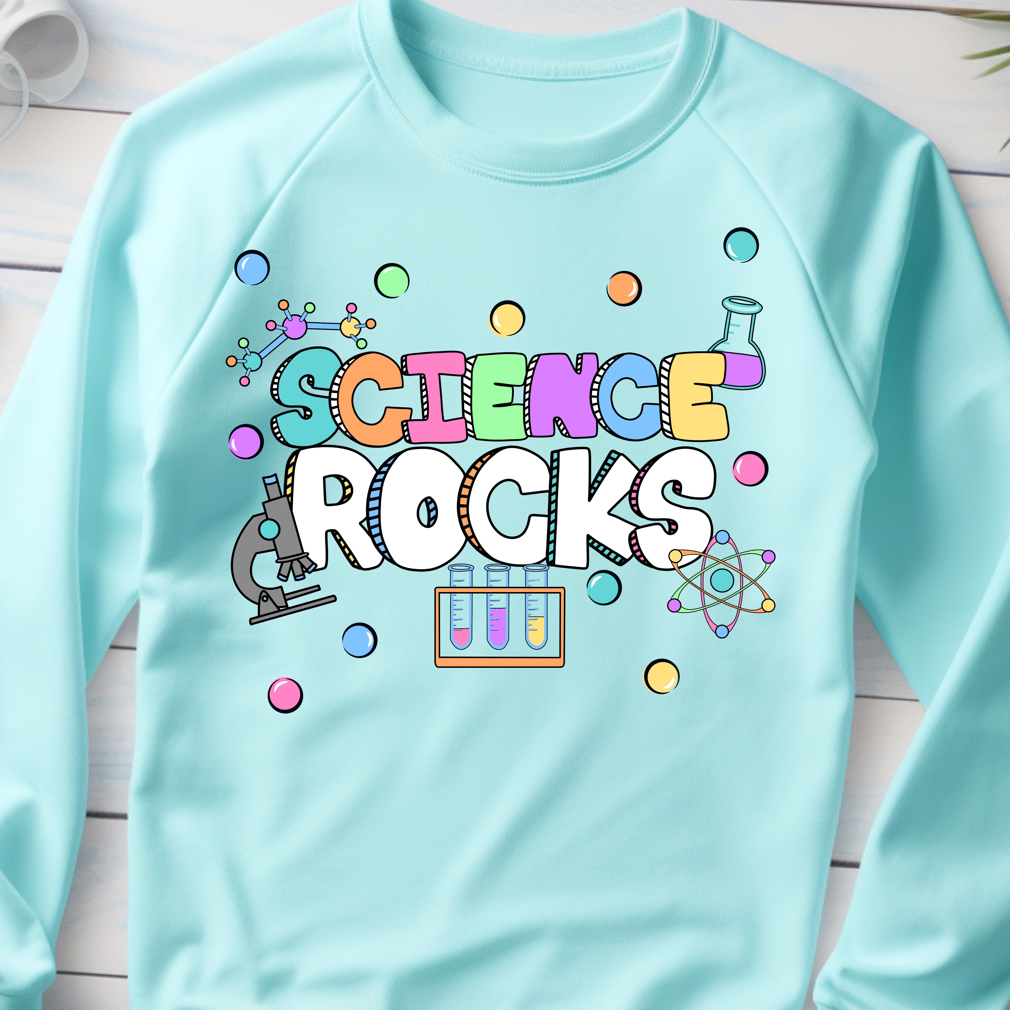 'Science Rocks' Vibrant Typography with Playful Scientific Symbols ...