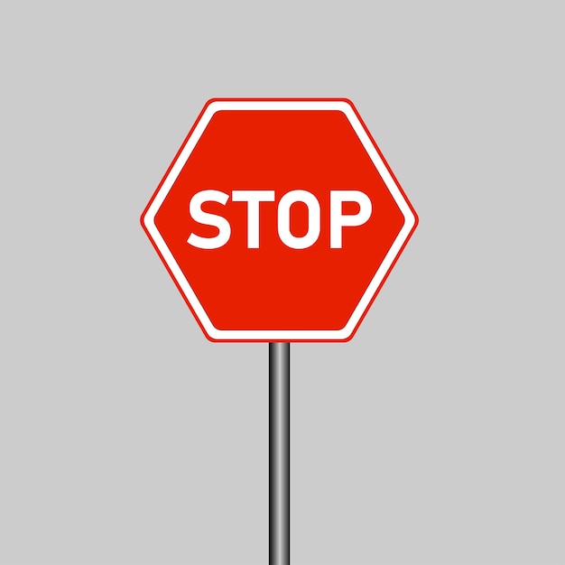 Iconic Red Stop Sign on Gray Background | Jiffy Designs